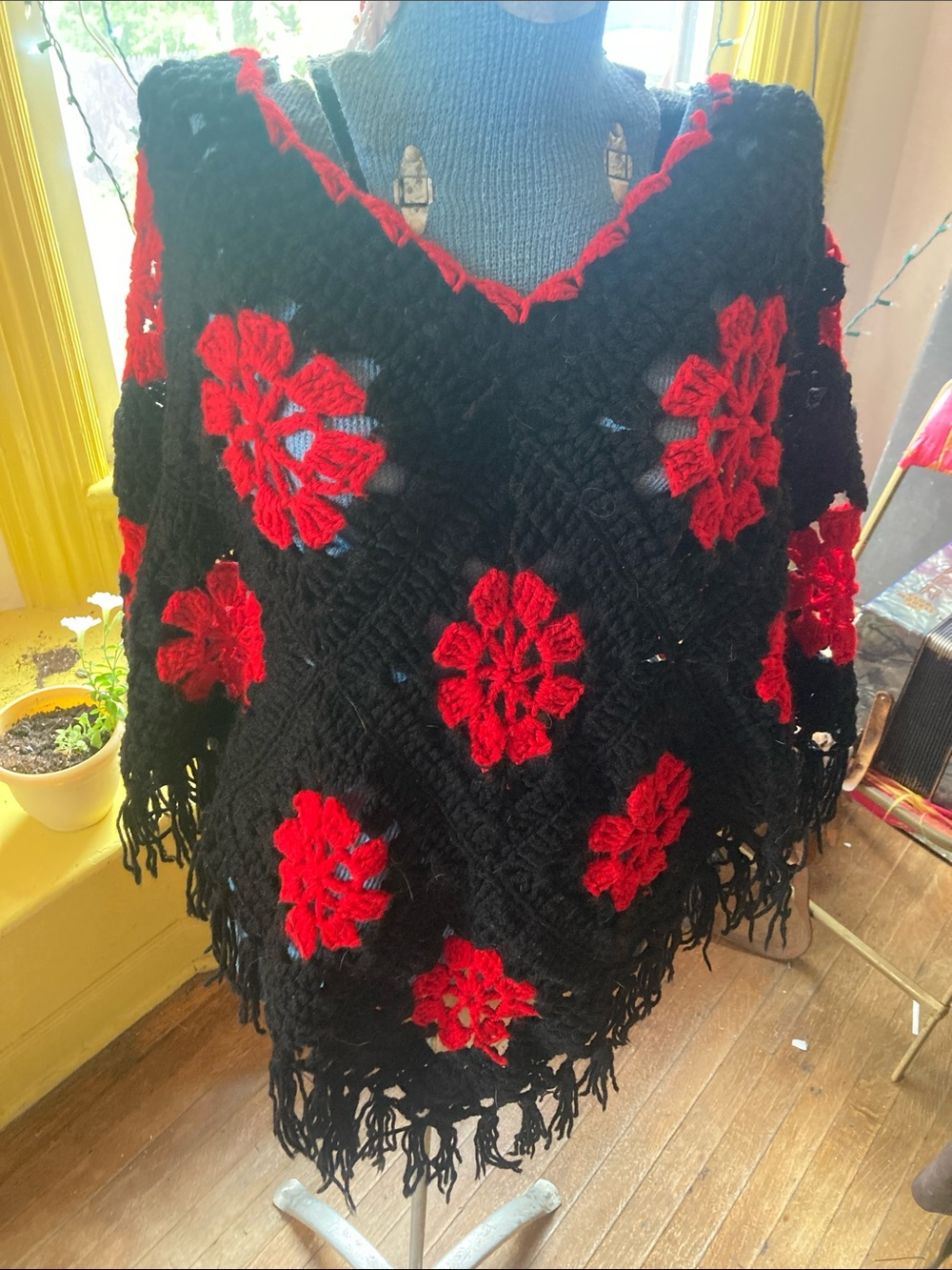 Black Crochet Poncho Sweater with Red Floral Accents